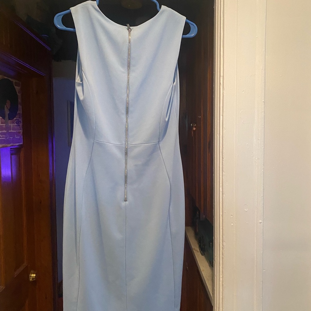 Baby blue Calvin Klein dress for work or play. Just below the knee